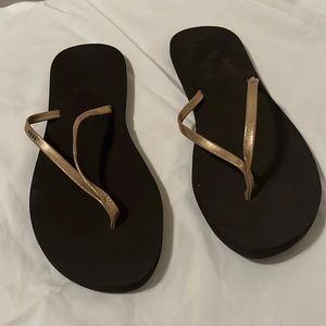EUC reef gold flip flops size 11 women